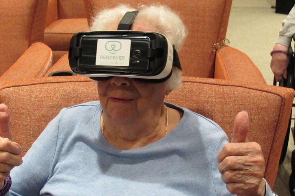 Resident with VR headset at Aspired Living of Westmont