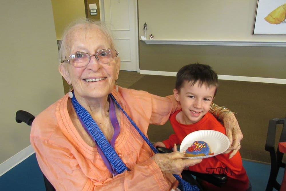 Resident and Grandchild at Aspired Living of Westmont
