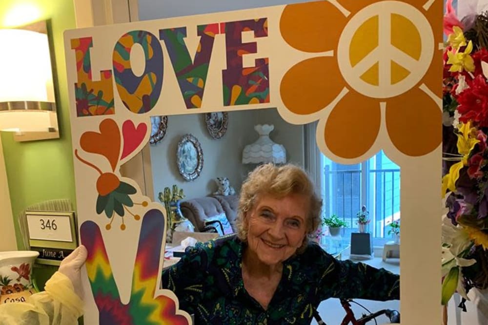 Resident with a peace sign at Azpira Place of Lake Zurich in Lake Zurich, Illinois