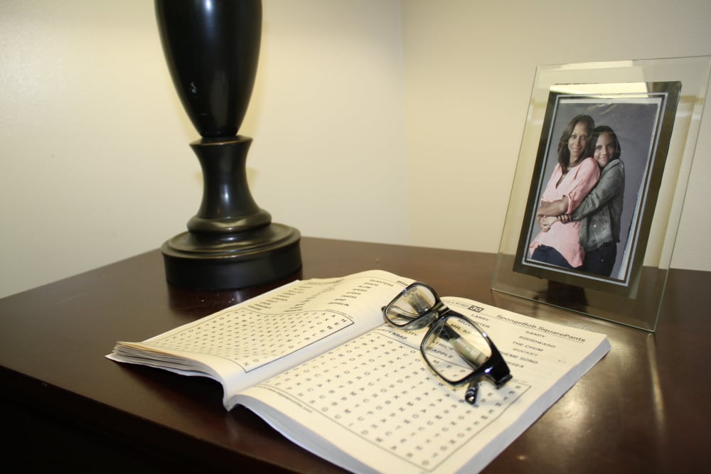side table with book and glasses