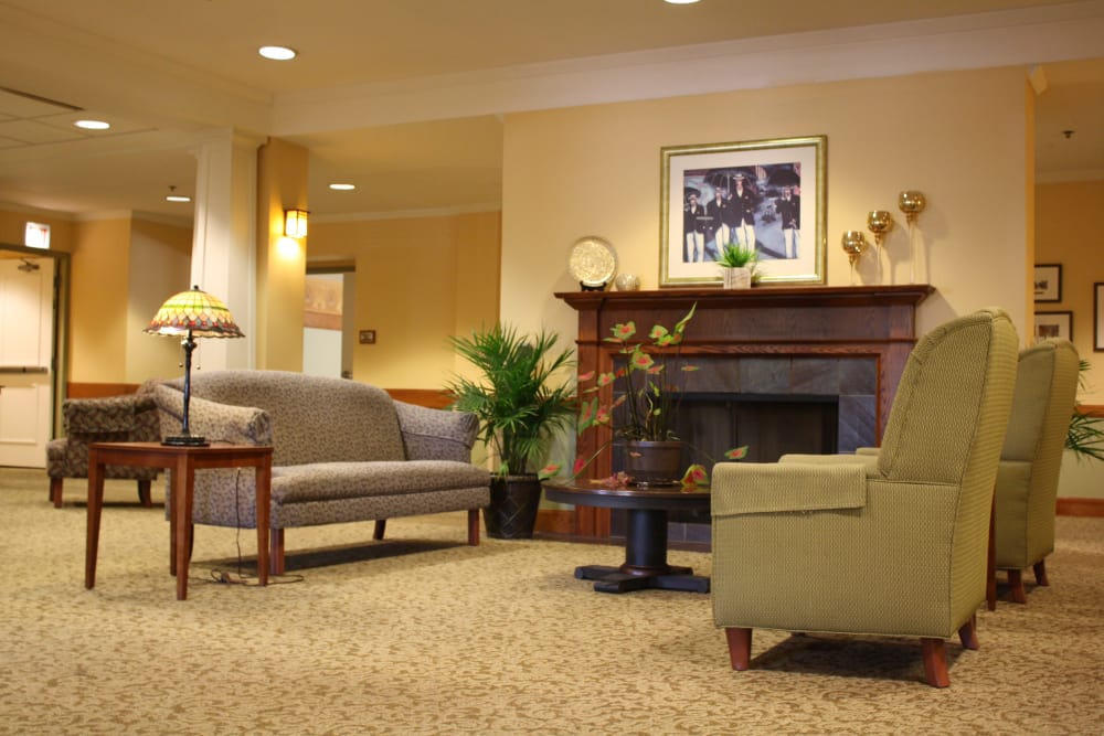 comfortable seating area by fireplace