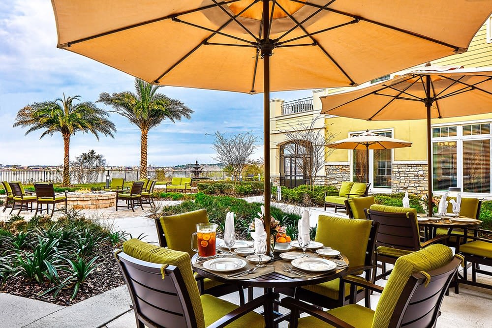 Covered outdoor seating at Azpira at Windermere in Windermere, Florida | Pathway to Living