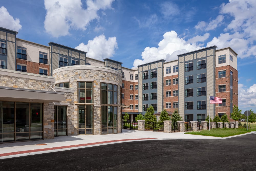 Parking lot and front entrance to Aspired Living of La Grange in La Grange, Illinois