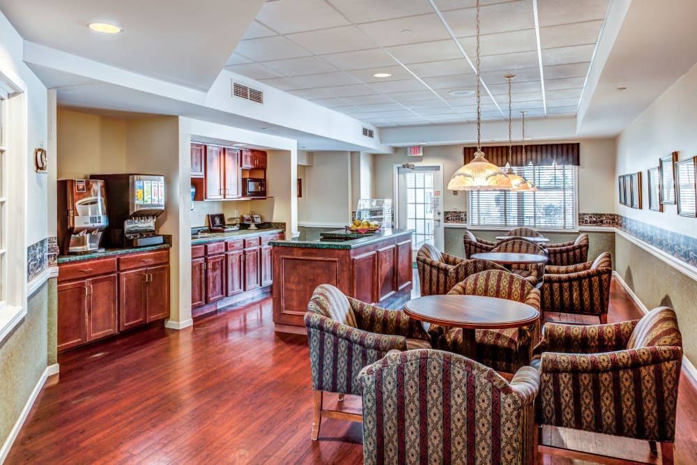 Indoor cafe with wood accents at Grand Victorian of Rockford in Rockford, Illinois