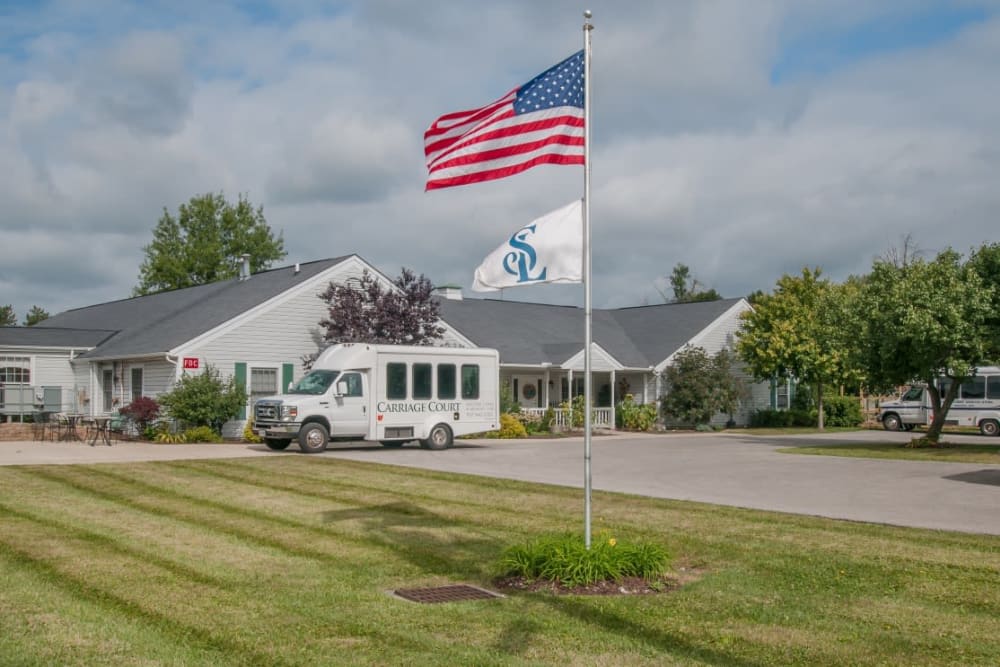 Facility with American flag outside at Carriage Court of Marysville in Marysville, Ohio.