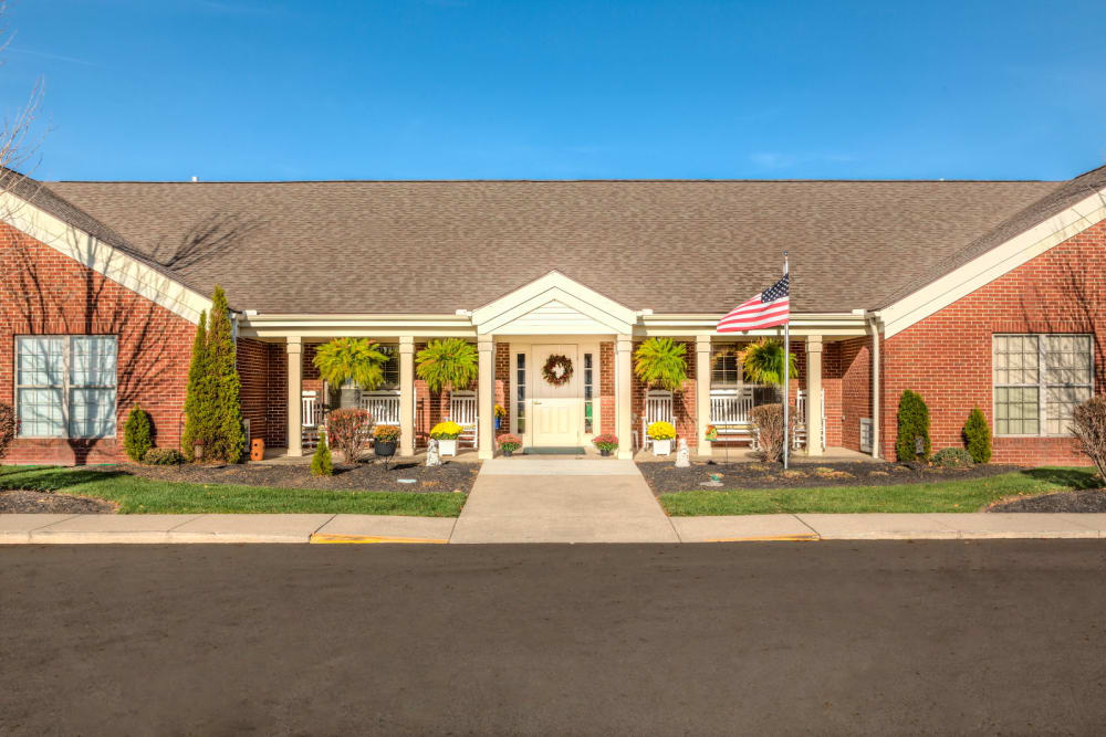 Sunny entryway to upscale senior living facility at Carriage Court of Washington Court House in Washington Court House, Ohio