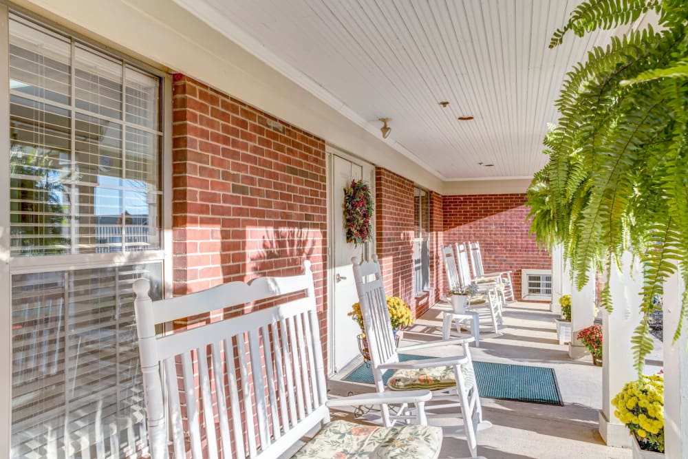 Sunny porch seating at Carriage Court of Washington Court House in Washington Court House, Ohio