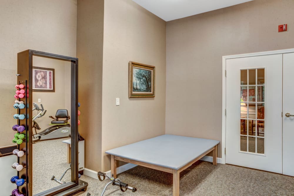 Fully equipped gym complete with weight set at Carriage Court of Lancaster in Lancaster, Ohio