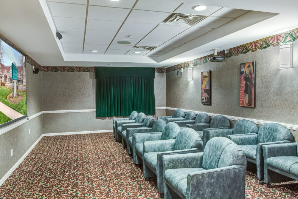 Deluxe movie room with comfortable seating at Grand Victorian of Sycamore in Sycamore, Illinois