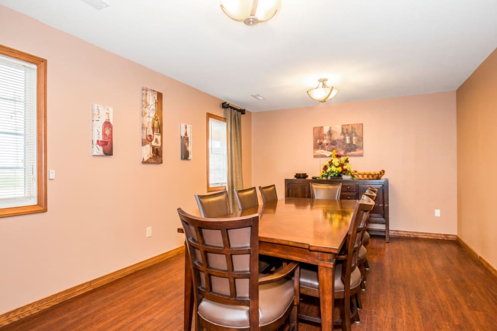 Dining area with wood accents at Brookstone Estates of Tuscola in Tuscola, Illinois