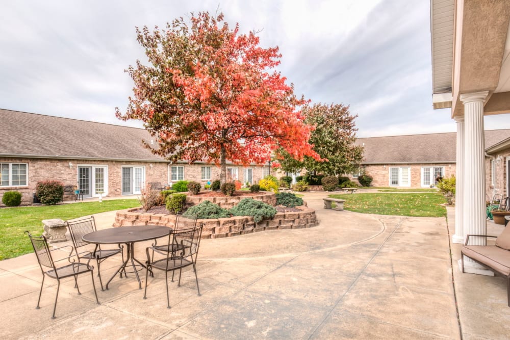 Inviting back patio with fall foliage at Brookstone Estates of Effingham in Effingham, Illinois.