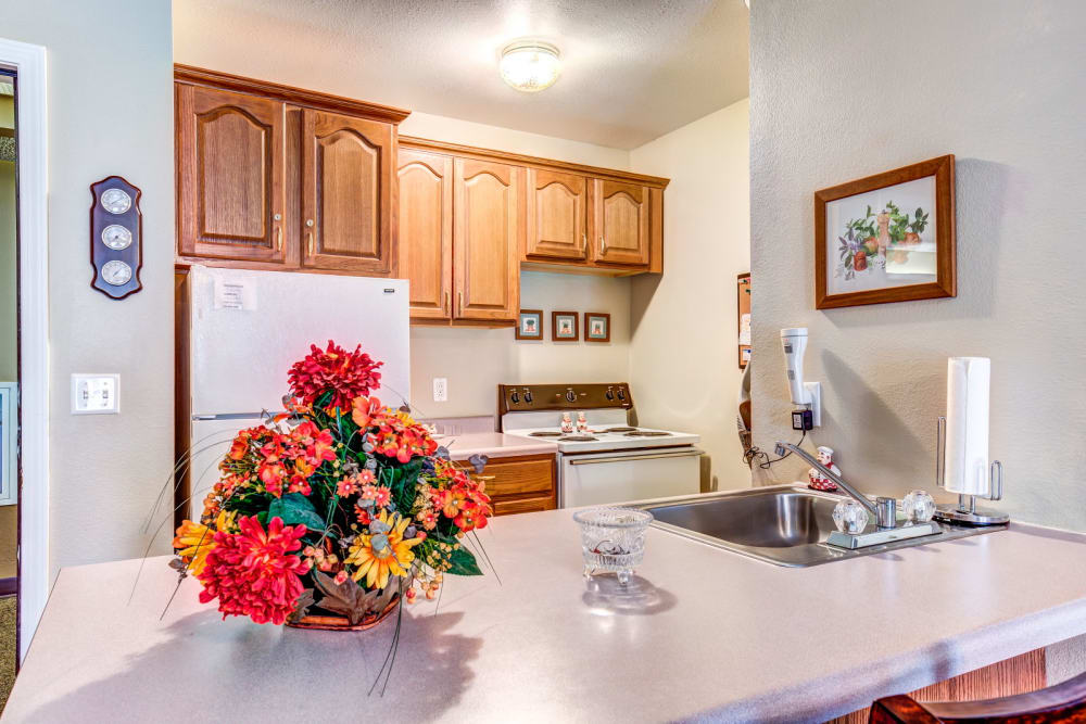 Kitchen area in assisted living apartment at Brookstone Estates of Effingham in Effingham, Illinois.