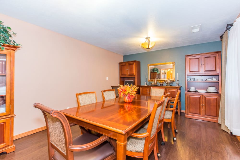 Dining room complete with wood accents at Brookstone Estates of Rantoul in Rantoul, Illinois
