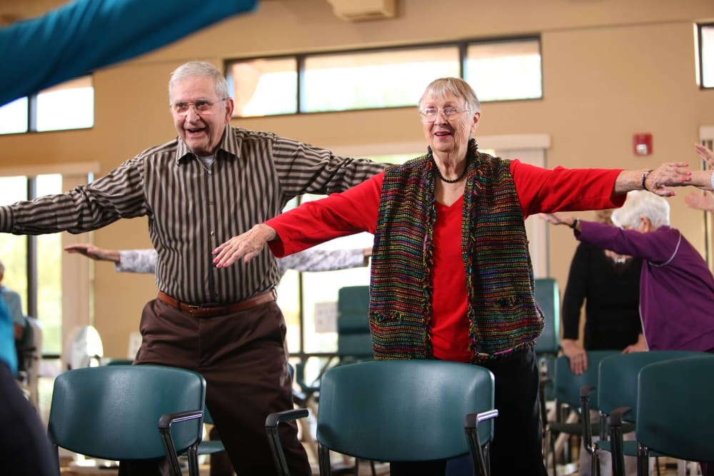 Residents enjoying themselves in an exercise/dance class at Brookstone Estates of Paris in Paris, Illinois