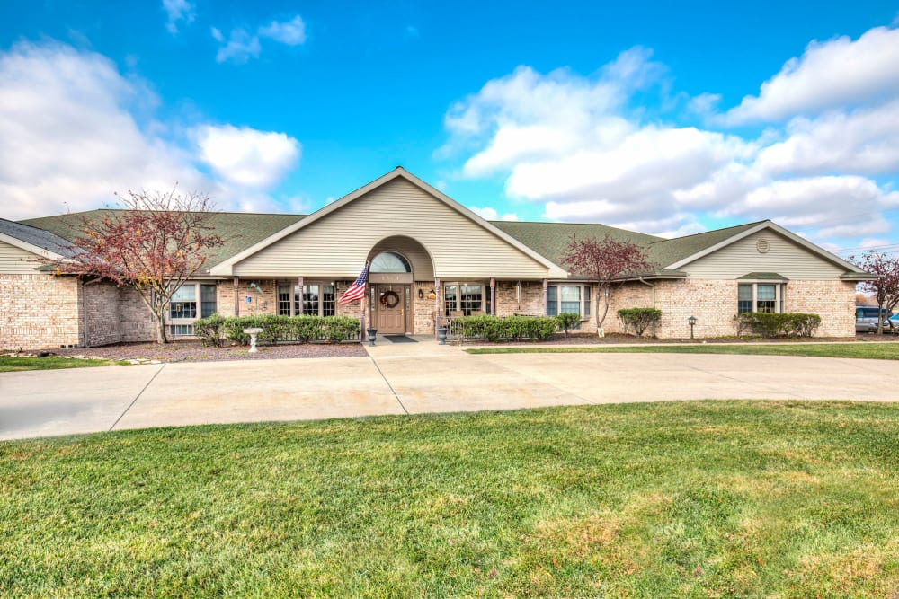 Sunny entryway of upscale senior living facility at Emerald Glen of Olney in Olney, Illinois