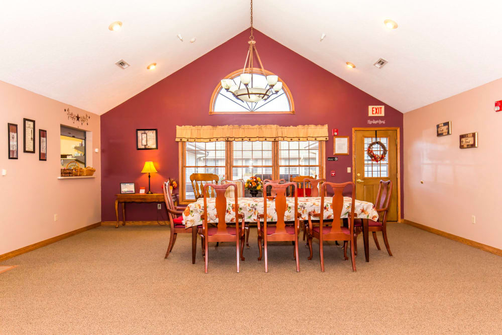 Elegant dining area with chandelier at Emerald Glen of Olney in Olney, Illinois