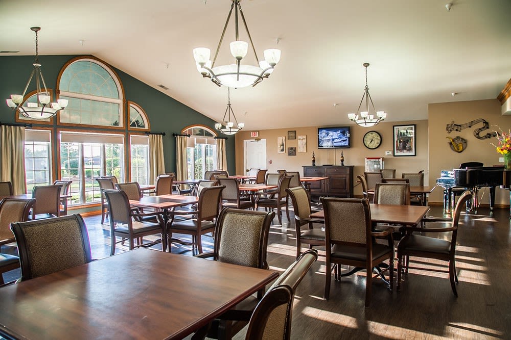 Dining room with high ceilings and wood accents at Brookstone Estates of Mattoon South in Mattoon, Illinois
