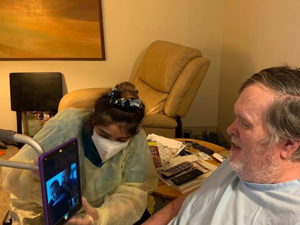 Resident facetiming at Victory Centre of Bartlett