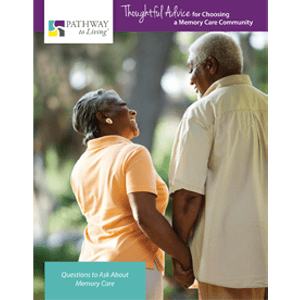 senior residents holding hands 