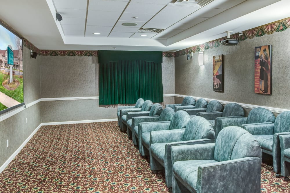 Deluxe movie theatre with comfy seating at Grand Victorian of Sycamore in Sycamore, Illinois