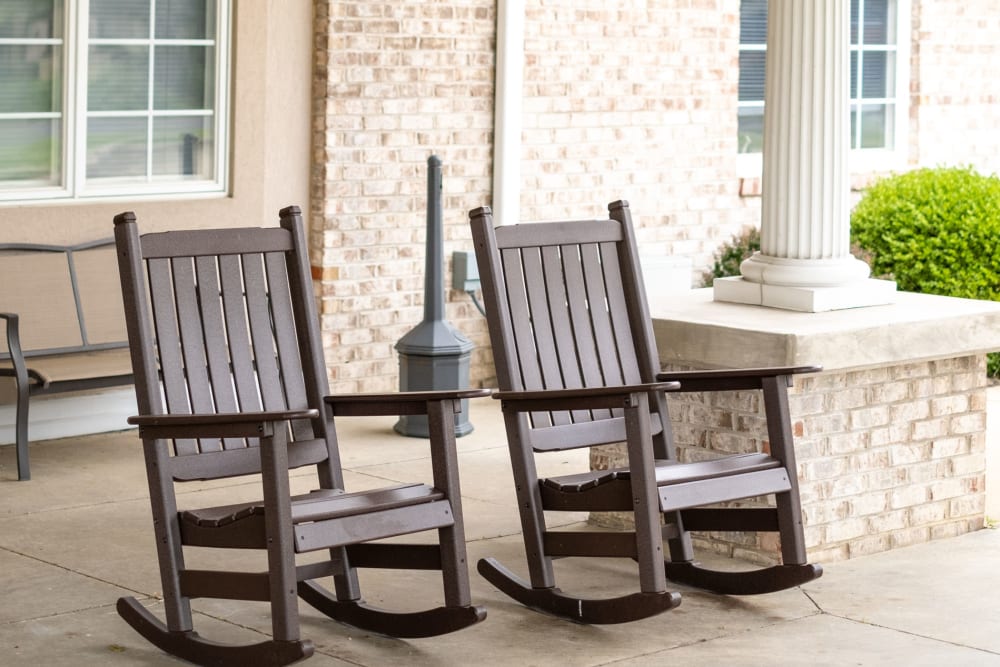 Charming rocking chairs on a porch at Brookstone Estates of Vandalia in Vandalia, Illinois