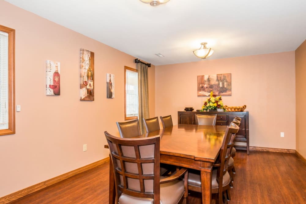 Dining room with wood accents at Brookstone Estates of Tuscola in Tuscola, Illinois