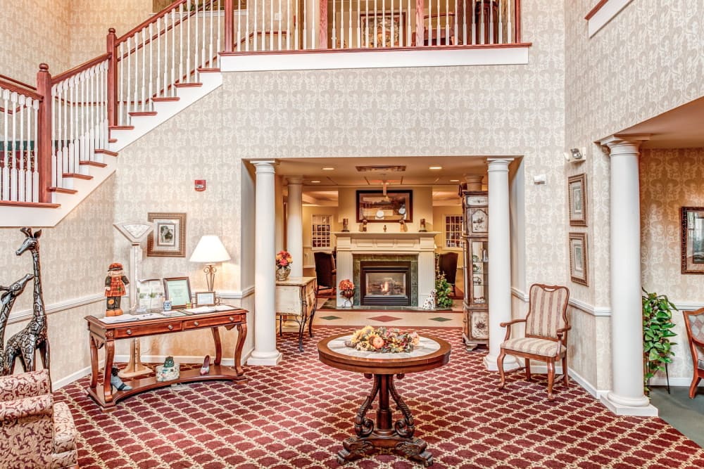 Sunlit lounge area with lots of seating at Grand Victorian of Sycamore in Sycamore, Illinois